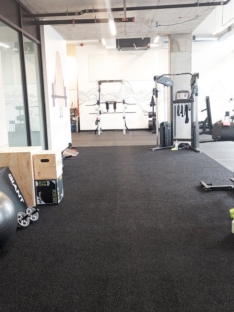 wide open turf space in Uplift Fitness, plenty of space for mobility, flexibility and cardio